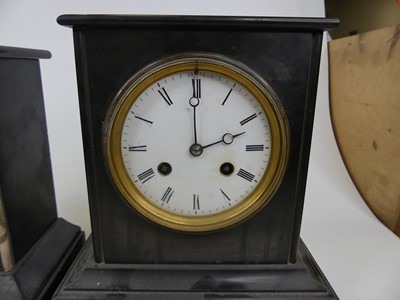 Lot 44 - A Victorian black slate cased mantel clock, of...