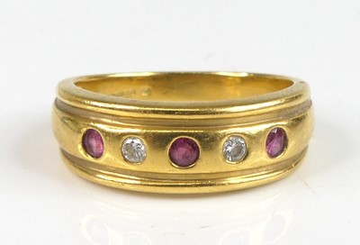 Lot 2806 - A modern 18ct gold, ruby and diamond set half...