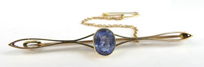 Lot 2816 - A 15ct gold and sapphire set bar brooch,...