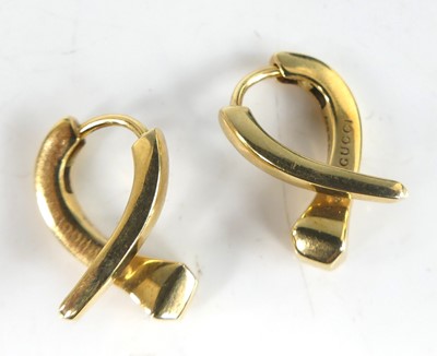 Lot 2820 - A pair of Gucci 18ct gold earrings, each...