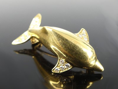 Lot 2821 - A contemporary 18ct gold diamond set dolphin...