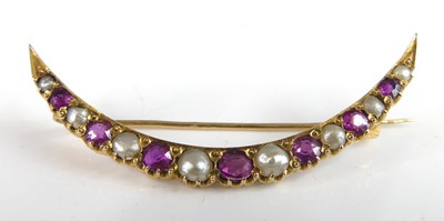 Lot 2810 - An Edwardian yellow metal, ruby and seed pearl...