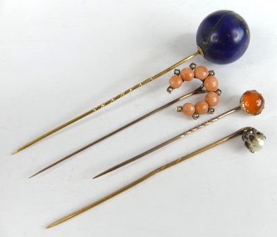 Lot 2831 - A tie-pin, having blue spherical hardstone...