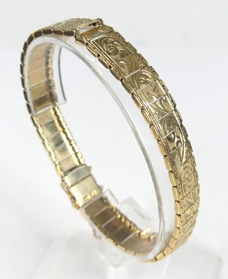 Lot 2838 - A 9ct gold sectional link bracelet with bright...