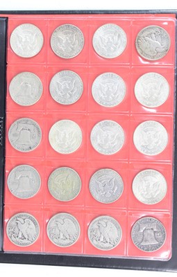 Lot 2044 - United States of America, a folder of coins to...