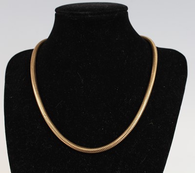 Lot 2866 - A 9ct gold snake link necklace with safety...