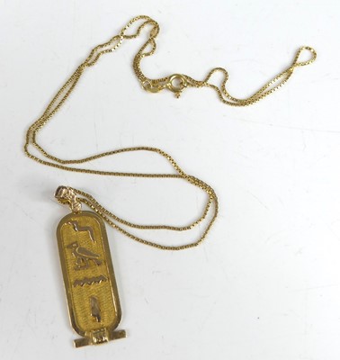 Lot 2850 - A contemporary Egyptian yellow metal pendant...