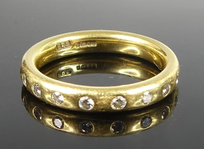 Lot 2855 - A contemporary 18ct yellow gold diamond...