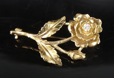 Lot 2858 - A modern 9ct gold diamond set flower head...