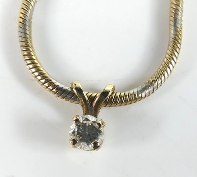 Lot 2860 - A 9ct gold mounted diamond pendant, the round...