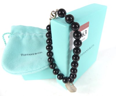 Lot 2863 - A Tiffany & Co. black onyx beaded bracelet...