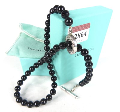 Lot 2864 - A Tiffany & Co. beaded black onyx necklace...