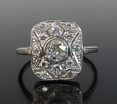 Lot 2154 - A white metal Art Deco diamond panel ring...