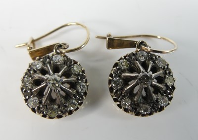 Lot 2212 - A pair of yellow and white metal diamond...