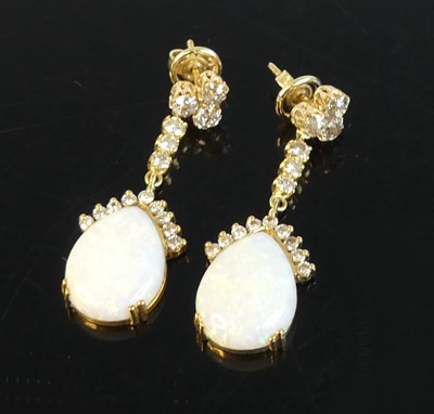 Lot 2224 - A pair of yellow metal opal and diamond drop...