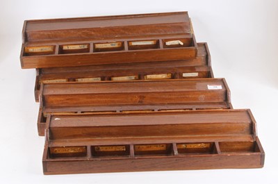 Lot 58 - A set of four oak scientific drawers, each...