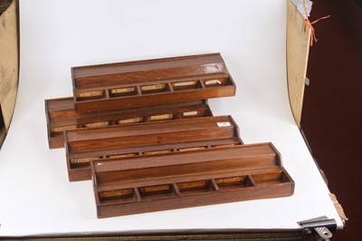 Lot 58 - A set of four oak scientific drawers, each...