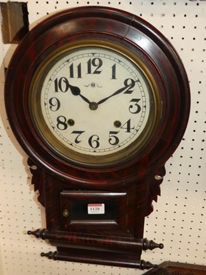 Lot 1128 - A simulated rosewood drop trunk wall clock