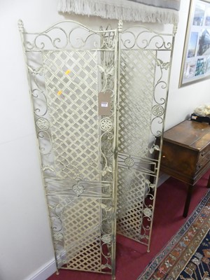 Lot 1158 - A contemporary cream painted wrought metal...