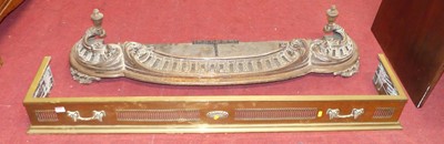 Lot 1168 - An Edwardian pierced brass curb fender, width...