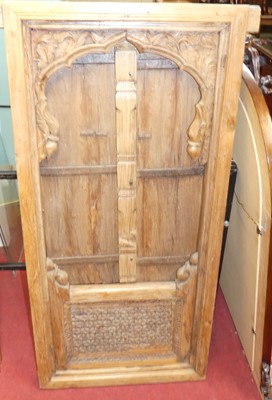 Lot 1172 - An Eastern teak and iron bound twin door...