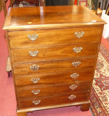 Lot 1175 - A flame mahogany and cross banded chest of six...