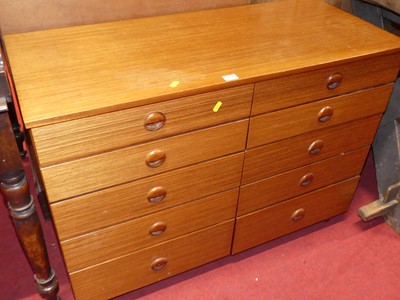 Lot 1204 - A 1970s Schreiber teak effect low chest,...