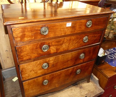 Lot 1207 - A 19th century mahogany low chest of four long...