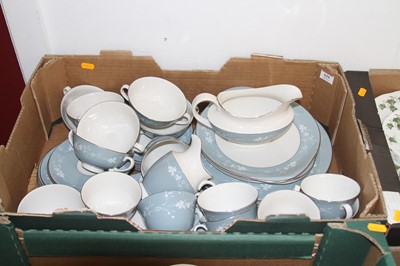 Lot 629 - A Royal Doulton part dinner and tea service in...