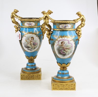 Lot 81 - A pair of late 19th century Servres style gilt...