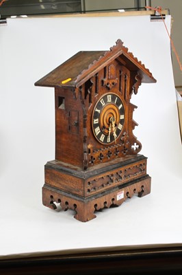 Lot 87 - An early 20th century oak cased cuckoo clock...
