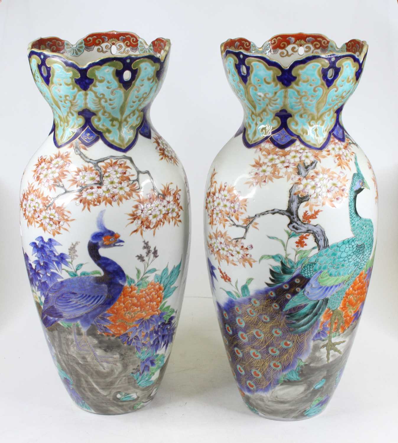 Lot 96 - A pair of Japanese pottery vases of baluster...