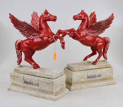Lot 113 - A pair of painted cast iron Mobil Oil...