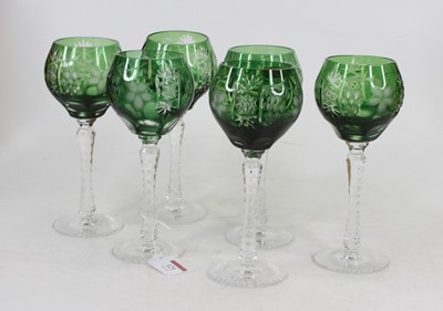 Lot 121 - A set of six cut glass wine hocks each having...