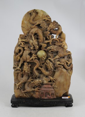 Lot 133 - A Chinese hardstone double sided carving in...