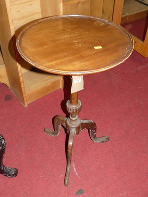 Lot 1259 - A mahogany circular fixed-top pedestal tripod...