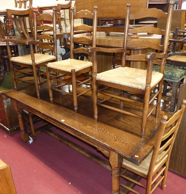 Lot 1268 - A contemporary joined oak dining suite in the...