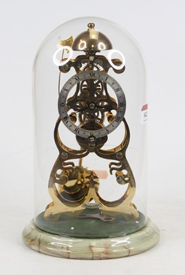 Lot 142 - A 20th century brass skeleton clock, the...