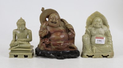 Lot 144 - A carved hardstone figure of a seated buddha,...