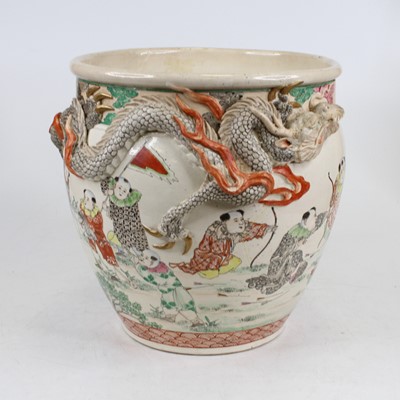 Lot 147 - A Chinese pottery jardiniere decorated with...
