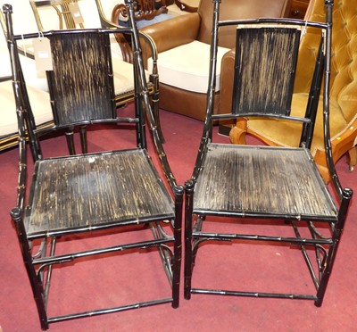 Lot 1321 - A pair of black painted bamboo framed,...