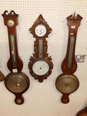 Lot 1118 - Two 19th century mahogany and inlaid wheel...