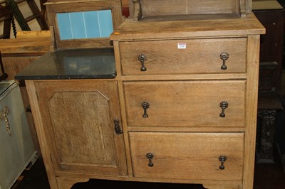 Lot 1330 - An Edwardian pale oak wash-chest, having a...