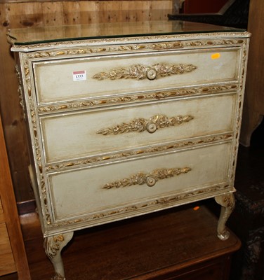 Lot 1333 - A French painted and gilt decorated low chest...