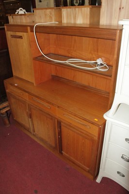 Lot 1340 - A 1970s G-Plan Fresco teak side cupboard, the...