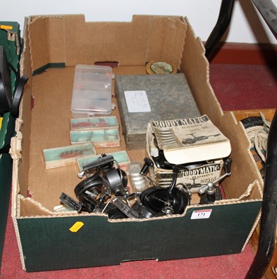 Lot 171 - A collection of reels and other fishing...