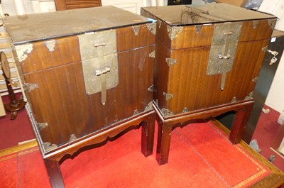 Lot 1354 - A pair of Chinese stained elm and brass bound...