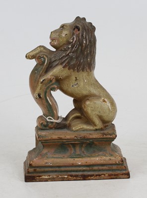 Lot 128 - A painted cast iron doorstop in the form of a...