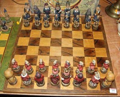 Lot 193 - A novelty composite chess set on birdseye...