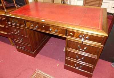 Lot 1356 - A reproduction mahogany and gilt tooled red...